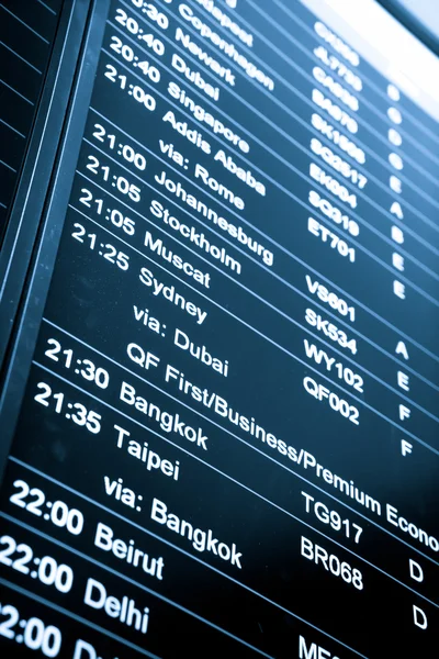 Flight arrival and departure sign board in airport