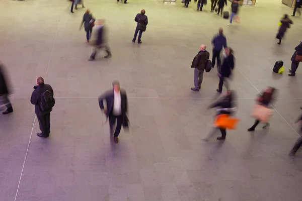 Movement of people in rush hour, london train station