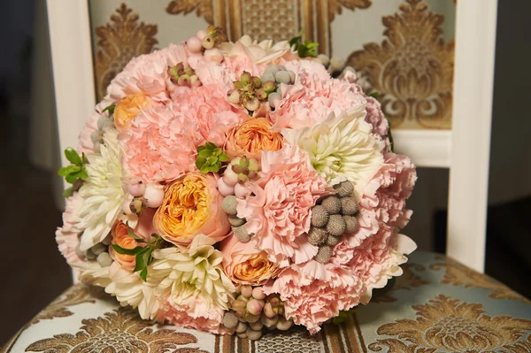 Wedding bouquet classic round shape of peony roses.  floristry