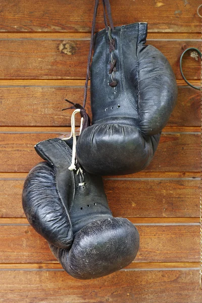 Old black boxing gloves