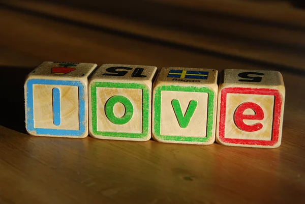 Spelling love with toy blocks
