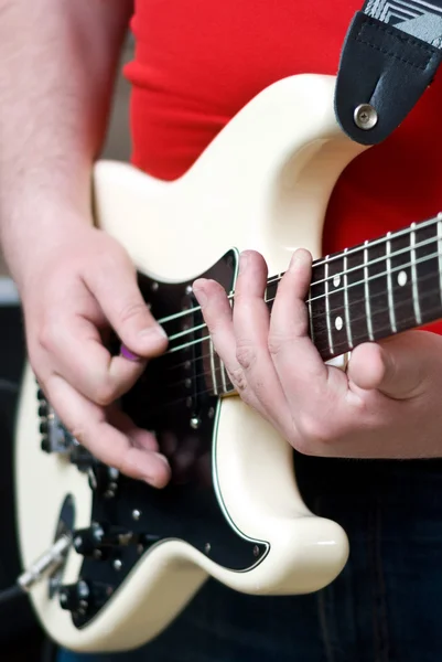 Playing an electric guitar