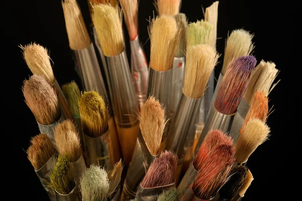 Paint brushes in a cup