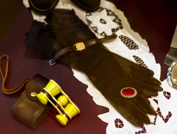 Vintage gloves with brooch. Binoculars with case.