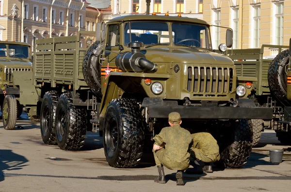 Preparing the car for the parade.