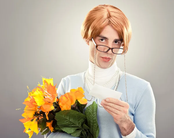 Ugly woman with glasses hold flowers on grey background