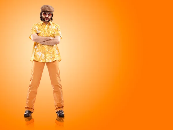 1970s vintage man stand with orange background