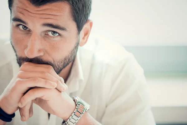 Beard businessman worried thoughtful at office