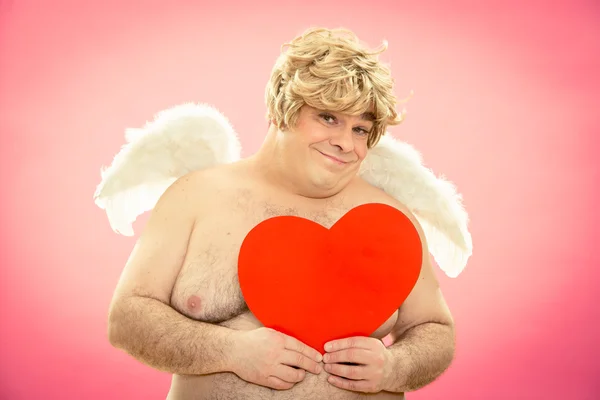 Happy cupid gives love heart for valentine day