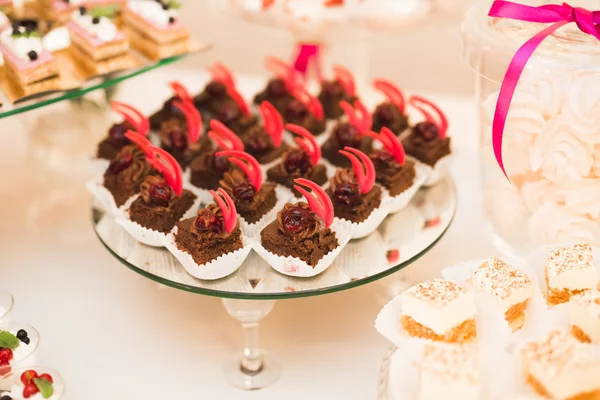 Delicious wedding reception candy bar dessert table