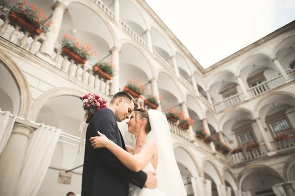 Luxury married wedding couple, bride and groom posing in old city