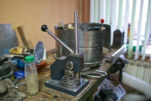 Ring-making machine on the table at jewelry workshop