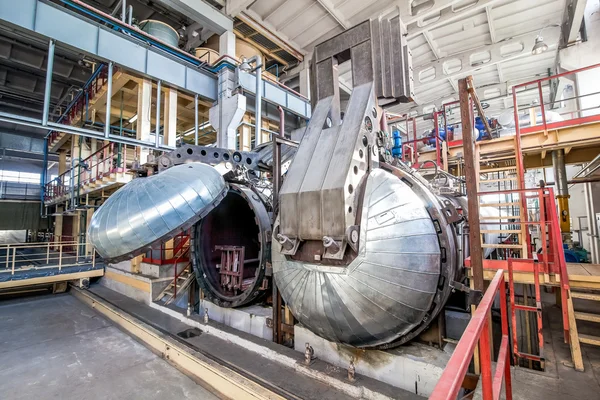 Industrial equipment at the factory in large  production hall