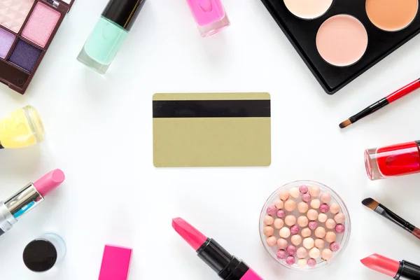 Cosmetics discount card with makeup set on white backround