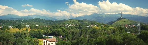 Village between green hills