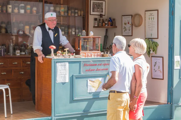 Reproduction of a traveling pharmacy with pharmacist