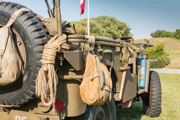 US military bag and strings on a jeep in exhibition