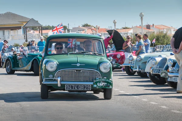 Parade of beautiful old English cars