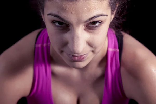Portrait of young boxer girl sweaty after the workout