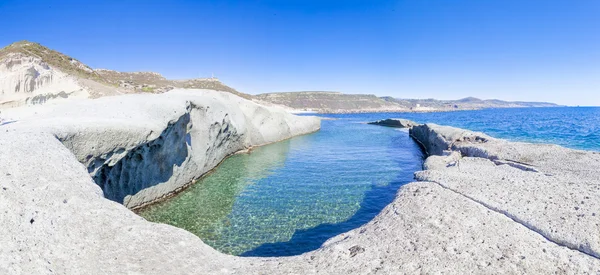 Beautiful natural pool carved into the rock on the west coast of
