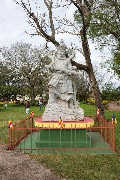 Statue of a Chinese warrior at the Buddhist temple