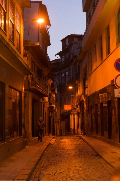 View of facades, alleyway and traditional houses in  Porto