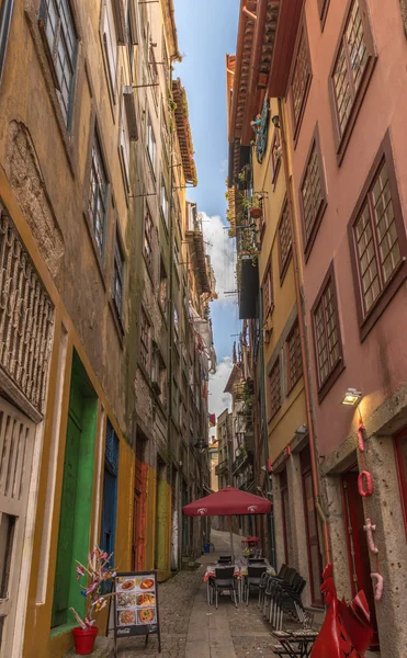 View of facades, alleyway and traditional houses in  Porto