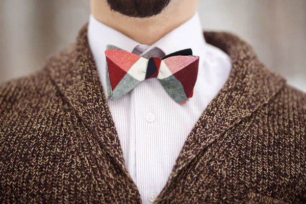 Close-up of man wearing bow-tie