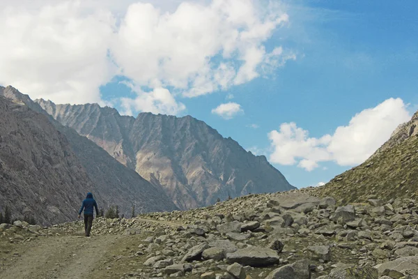 A man walking in the mountains alone