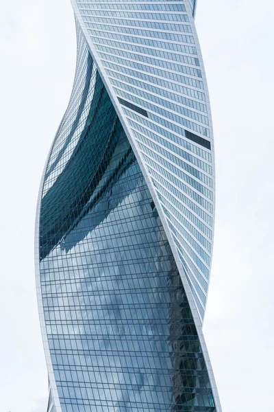 MOSCOW - AUGUST 21, 2016: Twisted modern skyscraper in Moscow city on August 21, 2016 in Moscow, Russia.