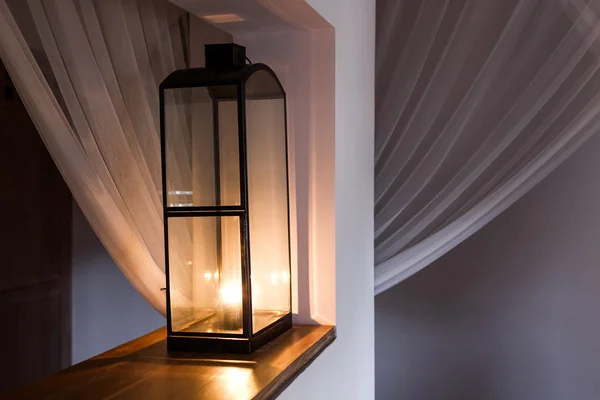 Vintage metal electric lamp in bedroom
