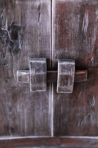 Vintage door knob on wooden antique door furniture