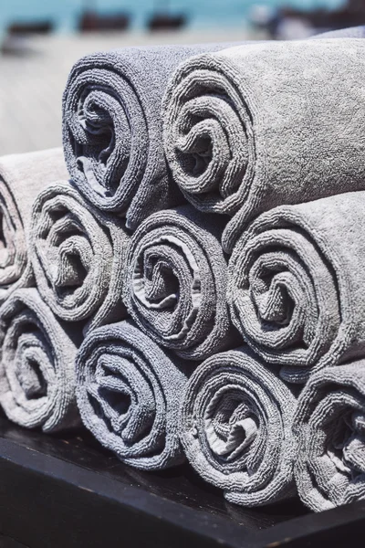 Stack of grey rolled towels