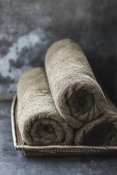 Stack of grey rolled towels