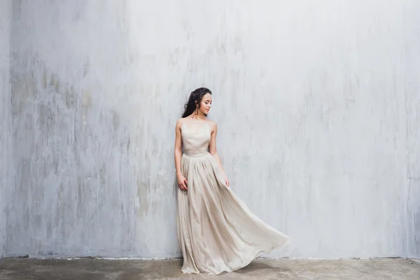 Bride in an elegant silk dress