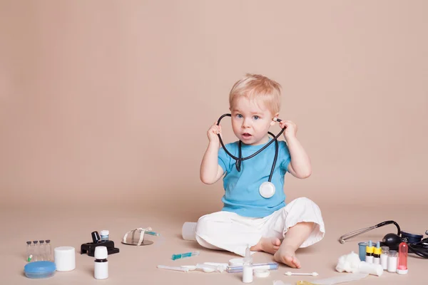 Boy playing doctor