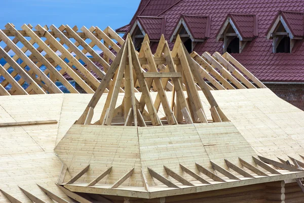 Roofing Construction. Wooden Roof Frame House Construction