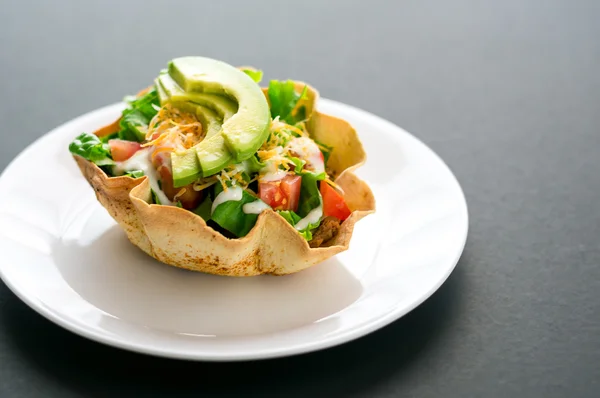 Taco salad in tortilla bowl