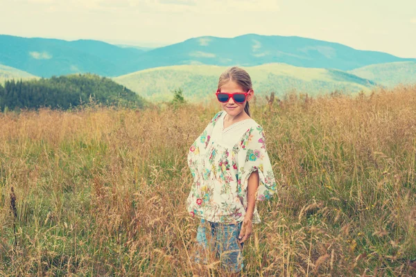 Little girl in hippie style