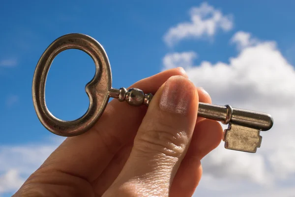 The Key into hand, Sky Background