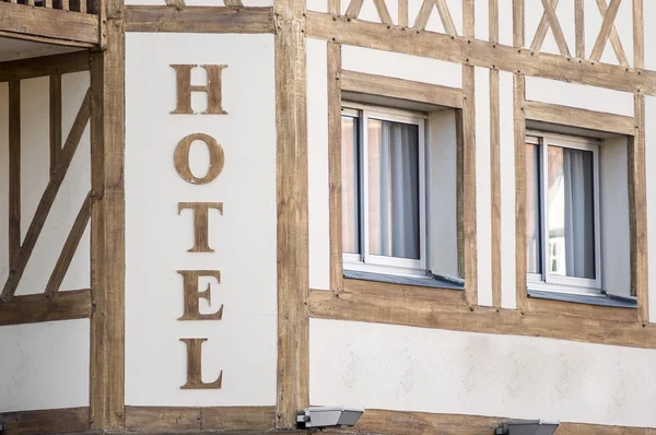 Timber frame hotel sign