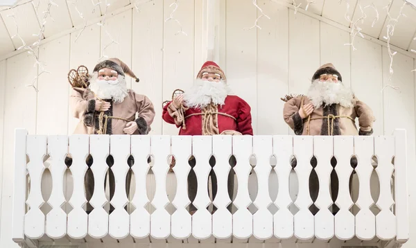 Santa Clauses on a balcony