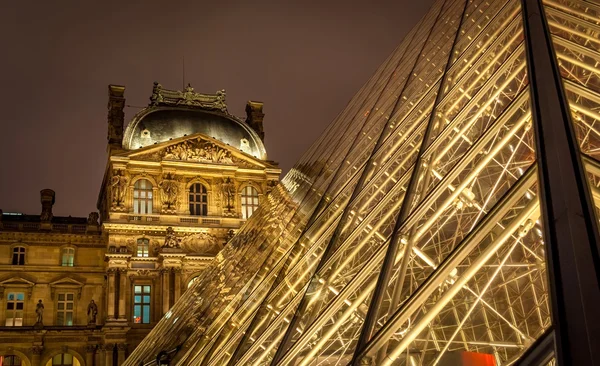 Louvre Pyramid at night closeup