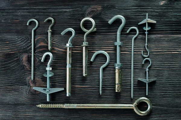 A set of fasteners. Ceiling hooks.