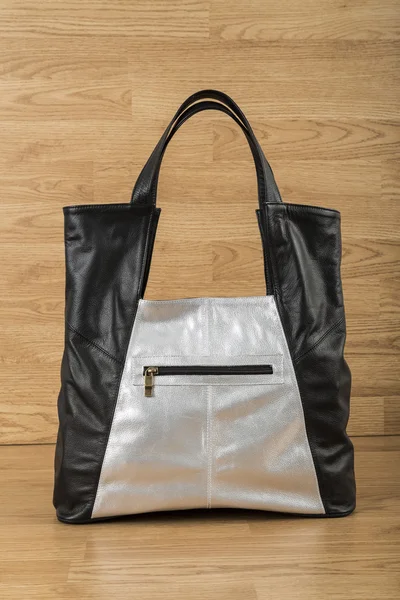 Black leather bag and gray Women
