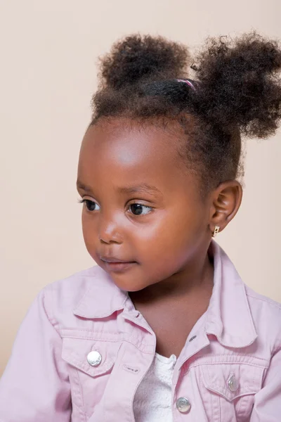 Studio portrait of a cute young African American girl