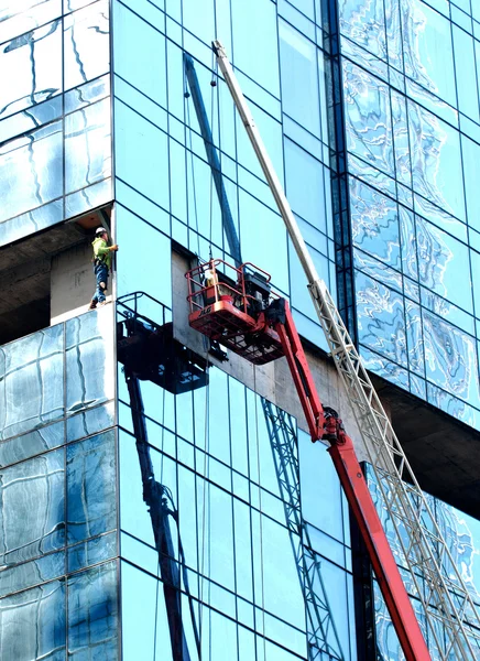 Window installation on skyscraper