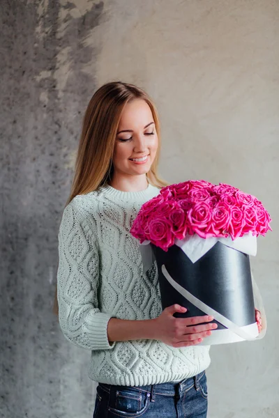 Girl with hat box flowers