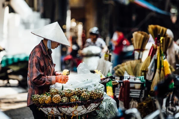 Street vendor with a cart on the street