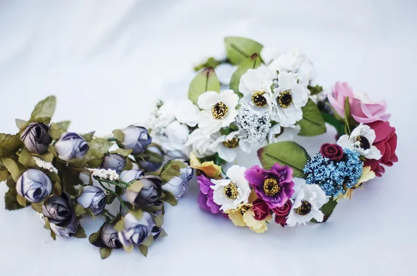 Hoop from flowers, wreath with colored flowers. Handmade flowers